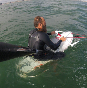 Sit on a kiteboard
