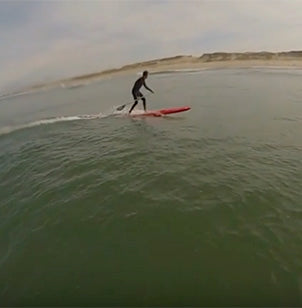 SUP Race surfing