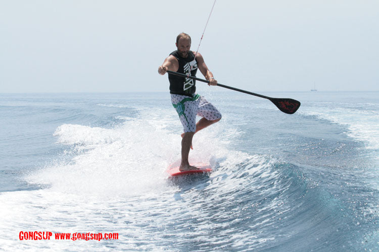 MOVE : hang five one foot behind a boat !!!