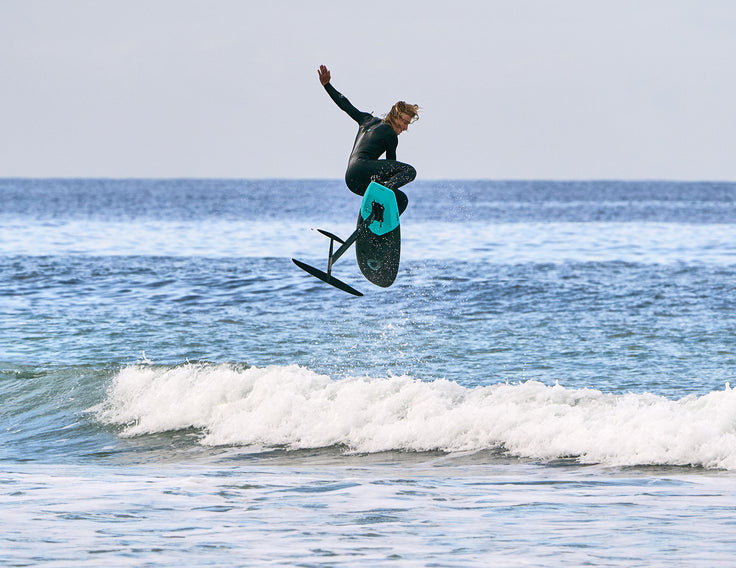 Alley-oop on a foiling board